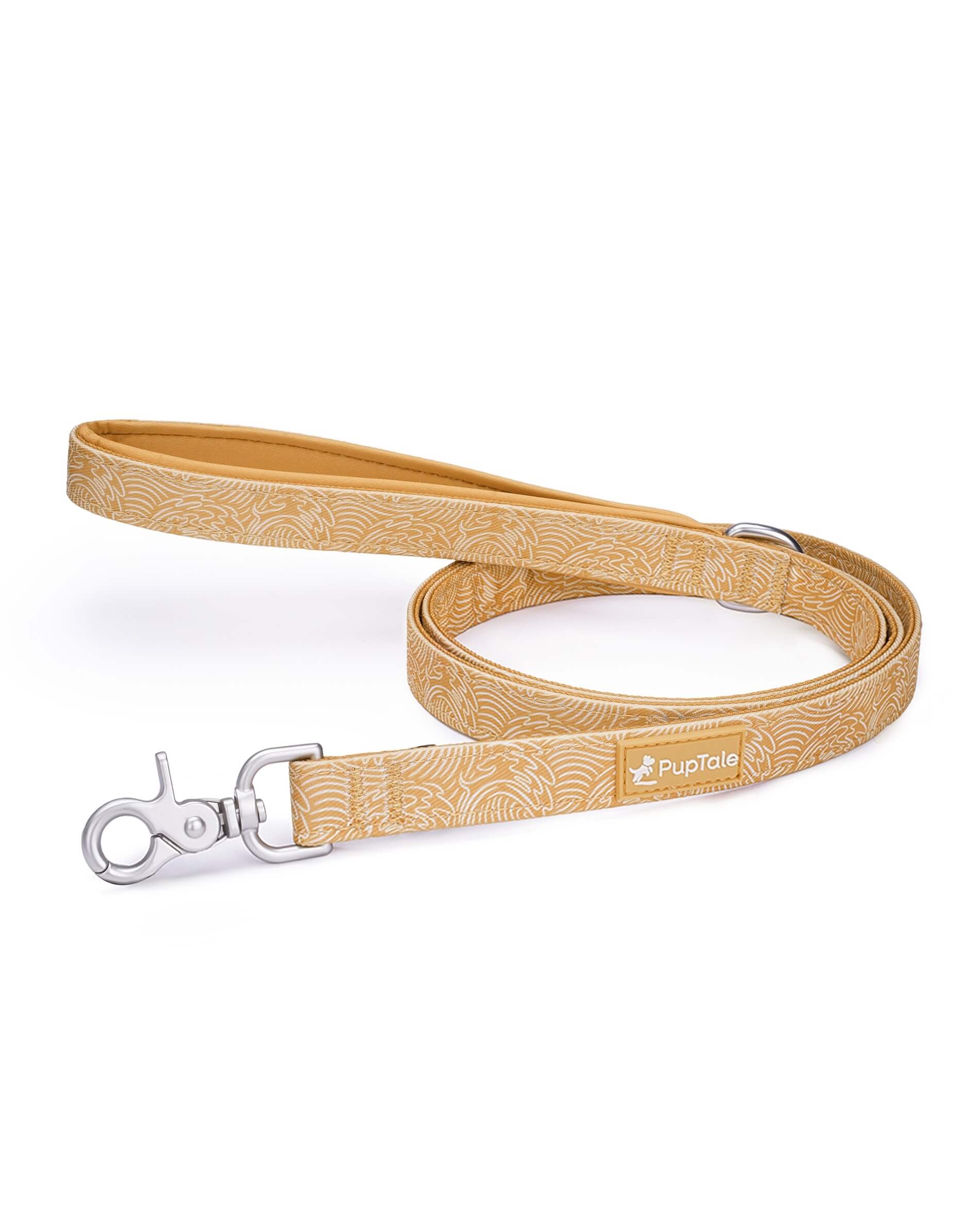 A golden dog leash with a padded handle and a zinc alloy hook.